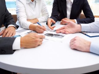 20151002170856-controllers-business-people-working-papers-meeting