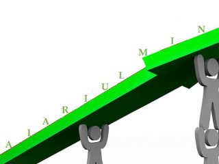 The word Raise on an arrow lifted by workers who are asking for an increase in pay for a job well done